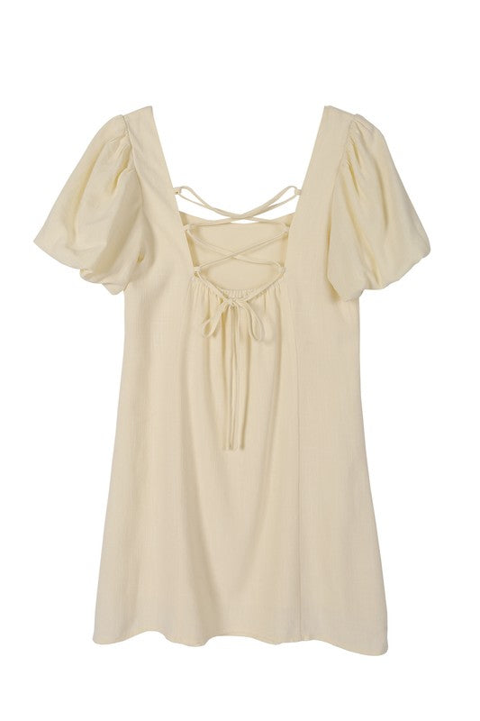 Scoop neck puff sleeve cream with back strap dress