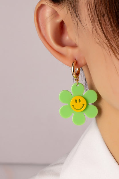 Huggie hoop dangling flower smiley face earrings