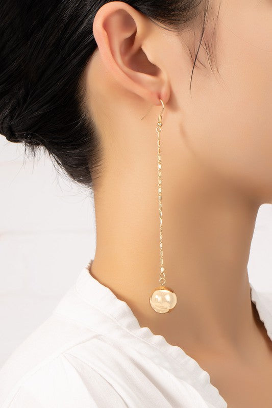 Long chain with dangling ball drop earrings