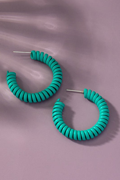 Spiral metal hoop earrings with color coating